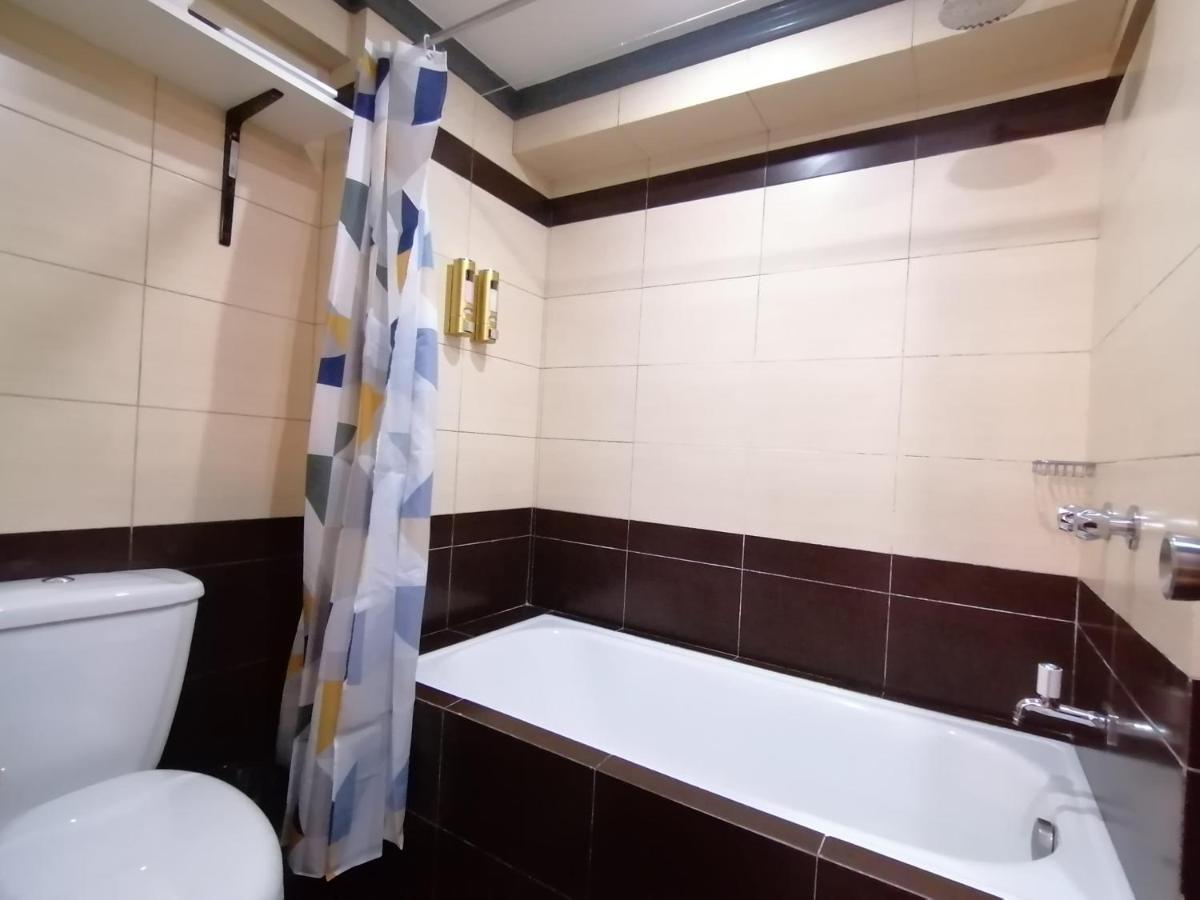 Condo Azur Suites E507 Near Airport, Netflix, Stylish, Cozy With Swimming Pool 麦克坦 外观 照片